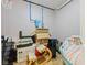 Basement storage with boxes, pet carrier, and chair for extra organizational space at 4681 Shelby Cir, Greenwood, IN 46143