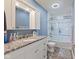 This bathroom features a tub and shower combo, granite vanity, modern fixtures, and tile flooring at 4681 Shelby Cir, Greenwood, IN 46143