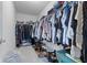 Walk-in closet with ample storage space, including shelving and hanging rods for organized clothing at 4681 Shelby Cir, Greenwood, IN 46143