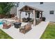 Outdoor living area with gazebo and patio furniture enhances this lovely backyard at 4681 Shelby Cir, Greenwood, IN 46143