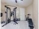 Home gym featuring weight machines and exercise bike for convenient fitness at 4681 Shelby Cir, Greenwood, IN 46143