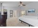 Comfortable main bedroom with an ensuite bathroom and walk-in closet entrances at 4681 Shelby Cir, Greenwood, IN 46143