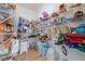Walk-in pantry with ample shelving, providing plenty of storage space for food and household items at 4681 Shelby Cir, Greenwood, IN 46143