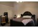 Bedroom with dark wood furniture and neutral colored walls at 5101 W Bay Rd, Plainfield, IN 46168