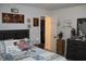 Charming bedroom featuring decorative pillows, Gathering pictures, and a relaxed atmosphere at 5101 W Bay Rd, Plainfield, IN 46168