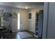 Entryway showcasing an accent rug, door with sidelight window, and white storage cabinet at 5101 W Bay Rd, Plainfield, IN 46168