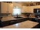 Spacious kitchen with stainless steel appliances, a center island, and modern countertops at 5101 W Bay Rd, Plainfield, IN 46168
