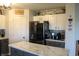Kitchen featuring stainless steel appliances, white cabinets, and marble countertops at 5101 W Bay Rd, Plainfield, IN 46168