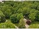 Overhead view showcases a wooded lot with mature trees surrounding this home at 5412 Green Hills Dr, Brownsburg, IN 46112