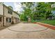 Private basketball court in backyard, complete with a play structure and ample space for recreation at 5412 Green Hills Dr, Brownsburg, IN 46112