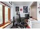 Cozy office with a large window, stylish desk, and office equipment at 5412 Green Hills Dr, Brownsburg, IN 46112