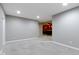 Finished basement featuring neutral paint, carpeted floors, and an open floorplan at 543 Amersham Ct, Avon, IN 46123
