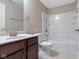 Bathroom with tile floors, single sink vanity, and shower and tub combination at 543 Amersham Ct, Avon, IN 46123