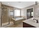Bathroom boasts separate shower, soaking tub, double sink vanity, and tile flooring at 543 Amersham Ct, Avon, IN 46123
