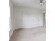 Bright bedroom features neutral walls, carpet, ceiling fan, and doors leading to other rooms at 543 Amersham Ct, Avon, IN 46123