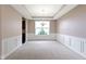 The dining room has decorative molding, and a bright window with outside view at 543 Amersham Ct, Avon, IN 46123