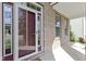 The entryway features a front door with sidelight windows, and brick accents at 543 Amersham Ct, Avon, IN 46123