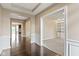 The foyer boasts hardwood floors and decorative moldings, enhancing the home's elegance at 543 Amersham Ct, Avon, IN 46123
