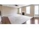 A spacious living room features wood flooring, lots of light, and a fireplace at 543 Amersham Ct, Avon, IN 46123