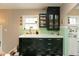 Well-lit kitchen with classic cabinets and ample counter space at 5616 Winthrop Ave, Indianapolis, IN 46220
