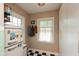 Quaint pantry offering generous storage and natural light at 5616 Winthrop Ave, Indianapolis, IN 46220