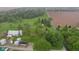 Beautiful aerial view of a countryside home with lush greenery, farmland, and multiple outbuildings at 6012 S 625 W, Pendleton, IN 46064
