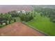 Aerial view of farm with fenced pasture and farm buildings at 6012 S 625 W, Pendleton, IN 46064