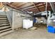 Unfinished basement with washer and dryer, block walls, and exposed ductwork at 6012 S 625 W, Pendleton, IN 46064