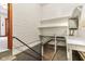 Basement stairs lead to a room with white wood paneled walls and a low ceiling at 6012 S 625 W, Pendleton, IN 46064