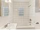 Bright bathroom featuring white subway tile, and a shower-tub combination at 6012 S 625 W, Pendleton, IN 46064