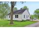Charming home with large front yard, mature shade trees, and a classic aesthetic at 6012 S 625 W, Pendleton, IN 46064