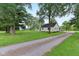 Inviting home with a long gravel driveway and spacious front yard at 6012 S 625 W, Pendleton, IN 46064