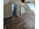 Bedroom with vaulted ceilings, skylight, and modern ceiling fan at 6117 Marilyn Rd, Indianapolis, IN 46226
