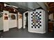 Basement showcasing painted floors and an open doorway at 6187 Crittenden Ave, Indianapolis, IN 46220