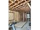 Interior view of a home under construction featuring exposed framing and an open layout at 6326 N Main St, Wilkinson, IN 46186