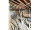 Interior view of a home under construction featuring exposed beams, studs, and open space at 6326 N Main St, Wilkinson, IN 46186
