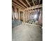 Interior view of a home under construction with wood framing, exposed ceiling, and an open layout at 6326 N Main St, Wilkinson, IN 46186