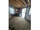 Unfinished interior of a building with exposed wood framing and weathered surfaces at 6326 N Main St, Wilkinson, IN 46186