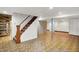Spacious basement with stairs and ample room for storage or recreation at 6430 E Southport Rd, Indianapolis, IN 46237