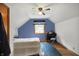 Bright bedroom with a ceiling fan, carpet, and writing desk at 6430 E Southport Rd, Indianapolis, IN 46237