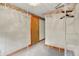 Walk-in closet featuring neutral carpet and metal racking at 6430 E Southport Rd, Indianapolis, IN 46237