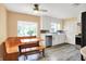 Charming kitchen with a cozy breakfast nook and white cabinetry providing ample storage at 6430 E Southport Rd, Indianapolis, IN 46237