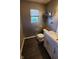 Modern bathroom with stylish vanity, updated fixtures, and sleek design at 6637 Larkwood Ct, Indianapolis, IN 46241