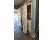 Laundry area with washer and dryer behind curtain, next to exterior door at 6637 Larkwood Ct, Indianapolis, IN 46241