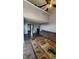 Open-concept living room with vaulted ceilings and stylish decor, including a plush sectional at 6637 Larkwood Ct, Indianapolis, IN 46241