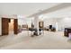 Expansive basement with carpet flooring, multiple entry points, and a versatile layout at 7310 Monaghan Ln, Indianapolis, IN 46217