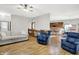 Open-concept living room leading to kitchen and upper level at 7310 Monaghan Ln, Indianapolis, IN 46217