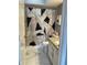 Modern bathroom with marble-patterned shower curtain and granite-top vanity at 7601 Newport Bay Dr # 203, Indianapolis, IN 46240