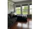 Bedroom with hardwood floors with a view at 7601 Newport Bay Dr # 203, Indianapolis, IN 46240
