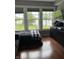 Bedroom with lake view, hardwood floors and a view at 7601 Newport Bay Dr # 203, Indianapolis, IN 46240